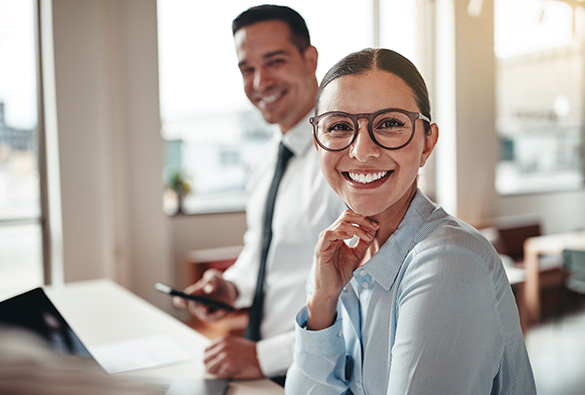  a woman and a man smiling