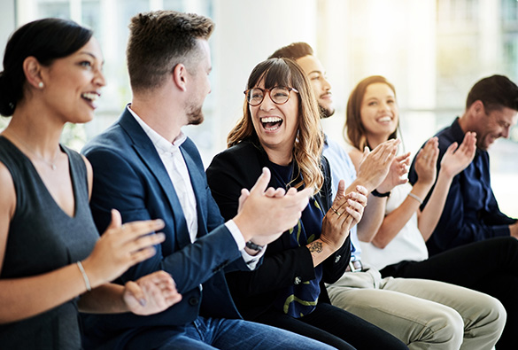  a group of people applauding