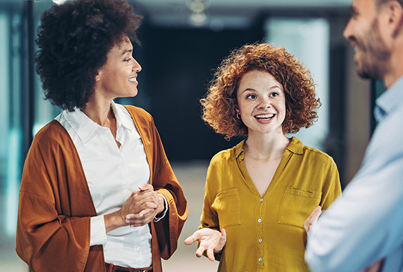  woman talking and two others looking at her