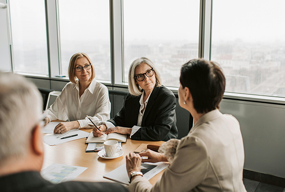 three womens in a meeting